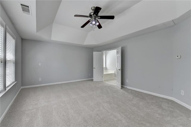 3805 Roxwood Park Dr, Buford, GA 30518 - unfurnished bedroom with a raised ceiling, carpet, and baseboards