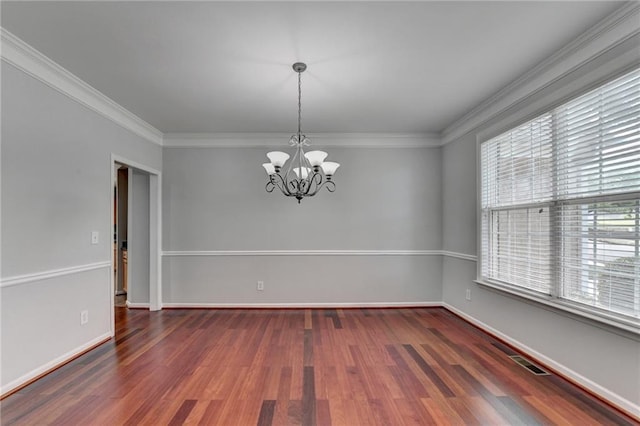 3805 Roxwood Park Dr, Buford, GA 30518 - empty room with a chandelier, wood finished floors, baseboards, and ornamental molding