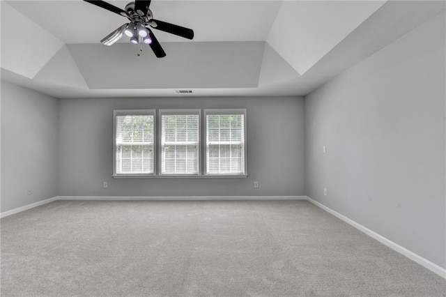 3805 Roxwood Park Dr, Buford, GA 30518 - unfurnished room with a raised ceiling, carpet flooring, a ceiling fan, and baseboards