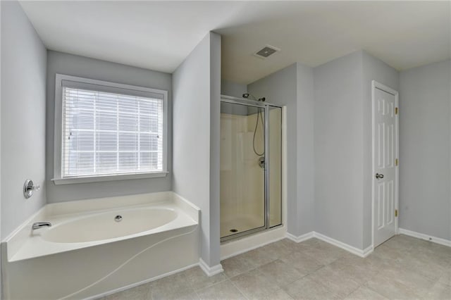 3805 Roxwood Park Dr, Buford, GA 30518 - full bathroom with a bath, a stall shower, and baseboards