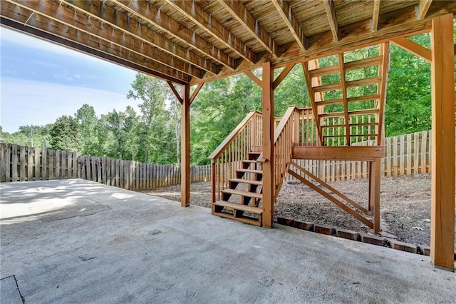 3805 Roxwood Park Dr, Buford, GA 30518 - fenced backyard featuring a patio and stairs