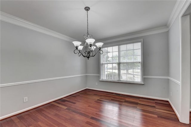 3805 Roxwood Park Dr, Buford, GA 30518 - spare room featuring crown molding, a chandelier, baseboards, and wood finished floors