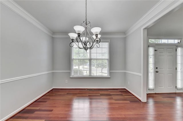 3805 Roxwood Park Dr, Buford, GA 30518 - spare room featuring a chandelier, wood-type flooring, crown molding, and baseboards