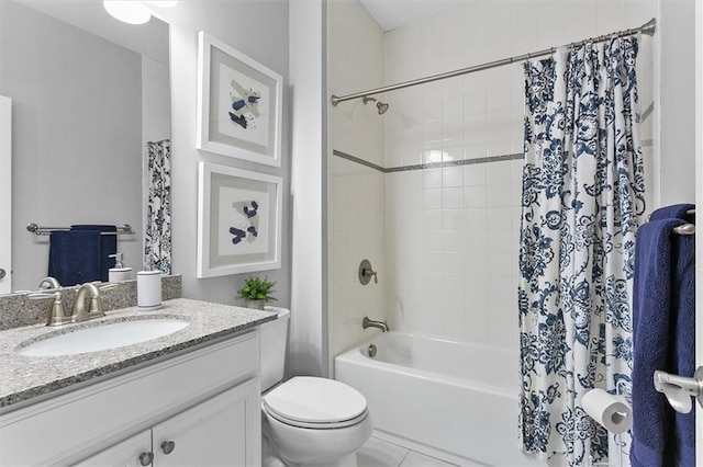 full bathroom featuring toilet, tile patterned floors, shower / tub combo with curtain, and vanity