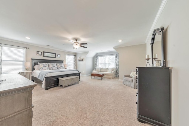 carpeted bedroom featuring ornamental molding and ceiling fan