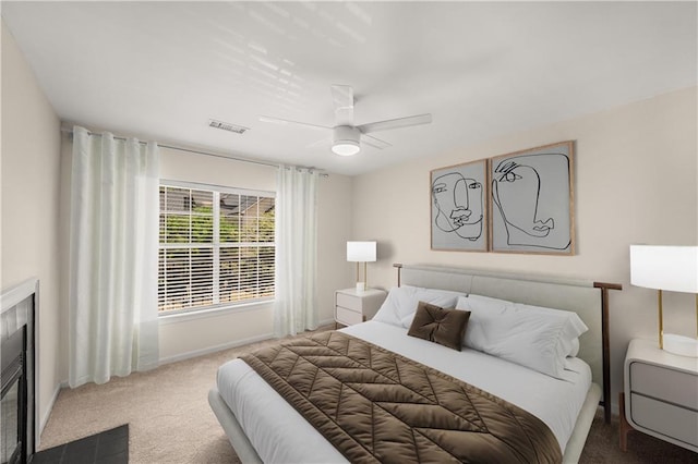 3655 Habersham Rd NE Unit 203, Atlanta, GA 30305 - bedroom with carpet floors, a ceiling fan, and baseboards
