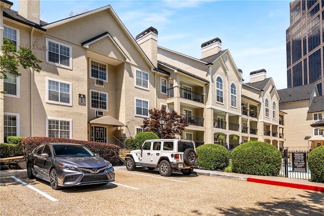 3655 Habersham Rd NE Unit 203, Atlanta, GA 30305 - view of property with uncovered parking