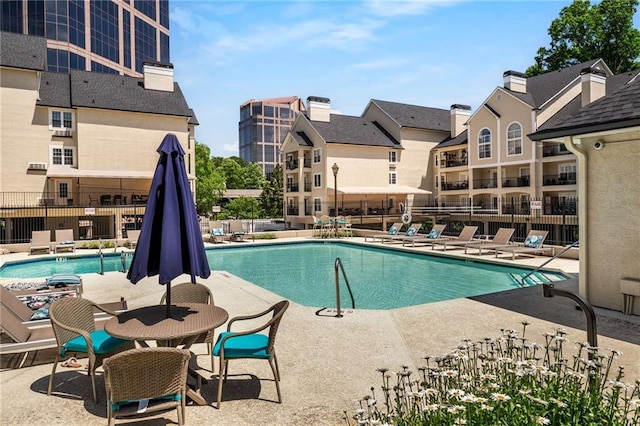 3655 Habersham Rd NE Unit 203, Atlanta, GA 30305 - community pool featuring a patio area