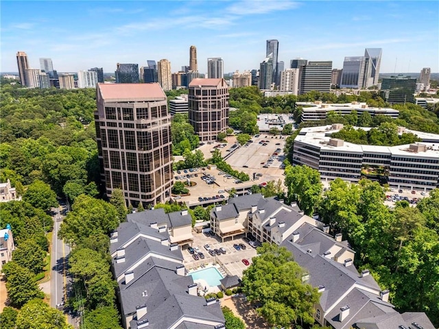 3655 Habersham Rd NE Unit 203, Atlanta, GA 30305 - drone / aerial view of skyline and a pool area