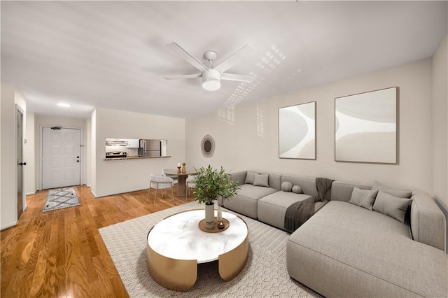 3655 Habersham Rd NE Unit 203, Atlanta, GA 30305 - living room featuring wood finished floors and a ceiling fan