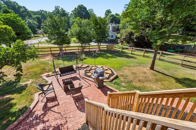 view of patio featuring a fire pit