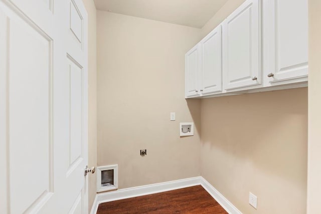 clothes washing area featuring cabinets, washer hookup, dark wood-type flooring, and electric dryer hookup