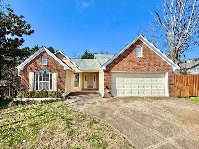 front of property featuring a garage and a front lawn