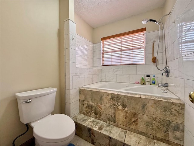 bathroom with a textured ceiling and toilet