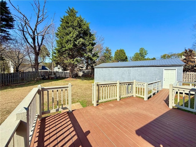 wooden terrace with a lawn