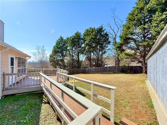 view of yard featuring a wooden deck