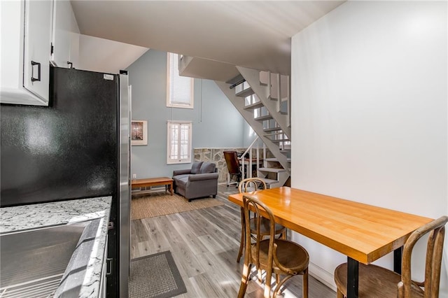 dining area featuring light hardwood / wood-style flooring