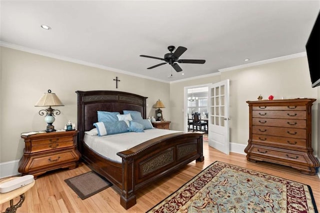 bedroom with baseboards, ceiling fan with notable chandelier, crown molding, light wood-style floors, and recessed lighting