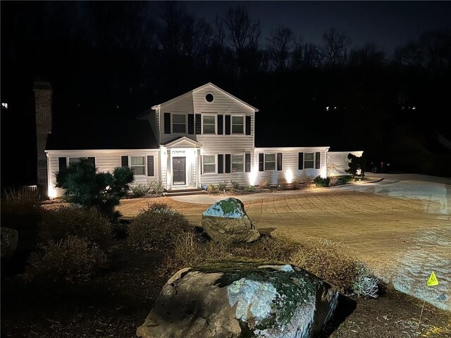 view of front of property with central AC unit