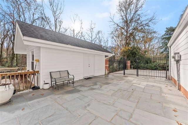 view of patio / terrace with a gate and fence