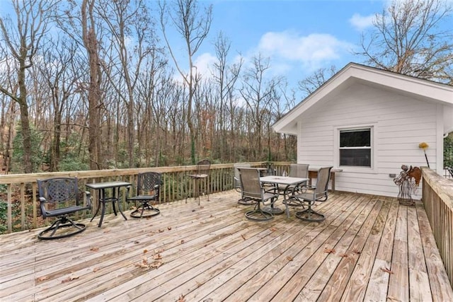 deck with outdoor dining space