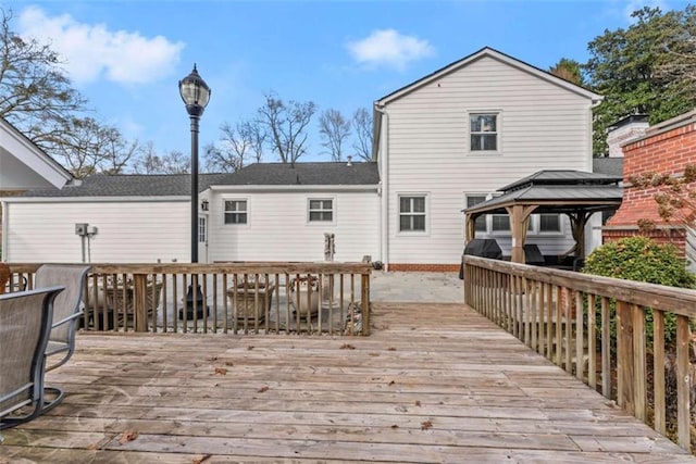 wooden deck with a gazebo