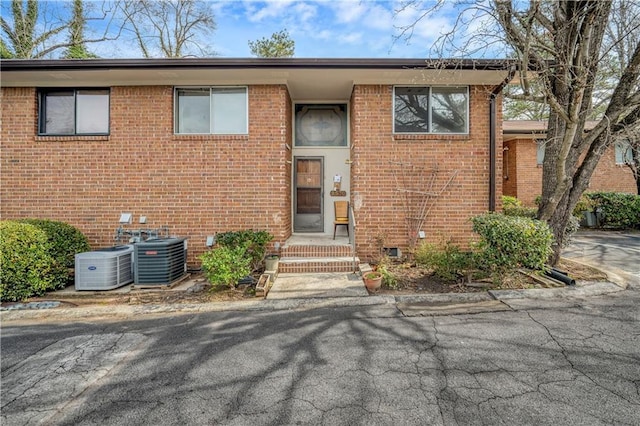 split foyer home featuring cooling unit