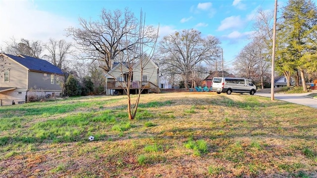 view of yard featuring a deck