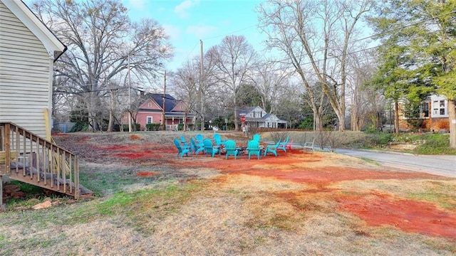 view of yard featuring stairway