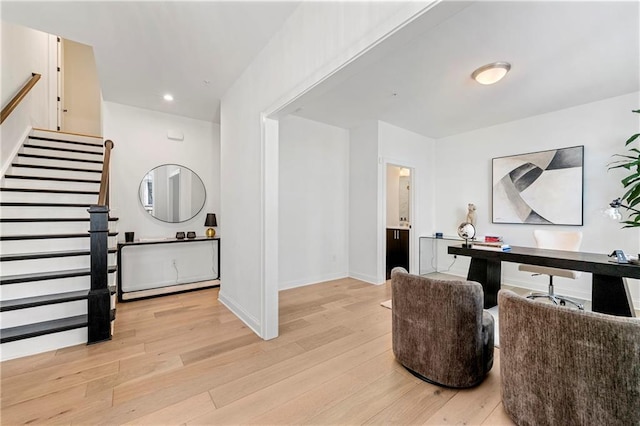 interior space with recessed lighting, light wood-type flooring, and baseboards