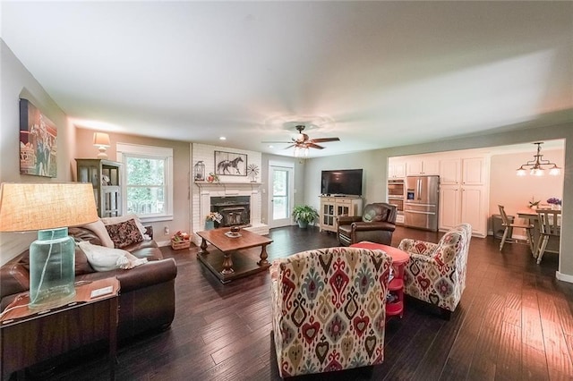 527 Gaddis Rd, Canton, GA 30115 - living area with dark wood-type flooring, a fireplace with raised hearth, a ceiling fan, and recessed lighting