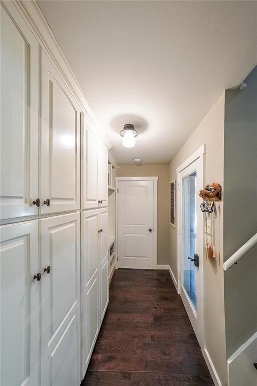 527 Gaddis Rd, Canton, GA 30115 - hallway featuring dark wood-type flooring and baseboards