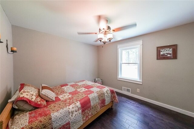 527 Gaddis Rd, Canton, GA 30115 - bedroom featuring dark wood-style floors and a ceiling fan
