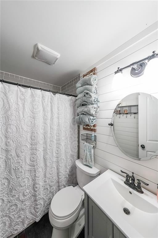 527 Gaddis Rd, Canton, GA 30115 - bathroom featuring toilet and vanity