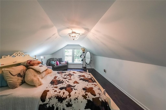 527 Gaddis Rd, Canton, GA 30115 - bedroom featuring vaulted ceiling and dark wood-style flooring