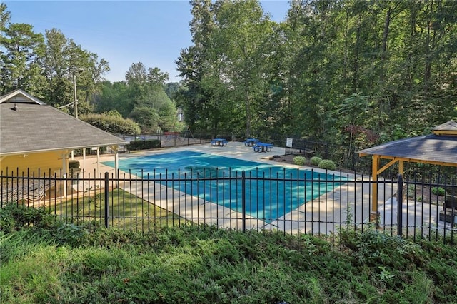 view of swimming pool featuring a patio