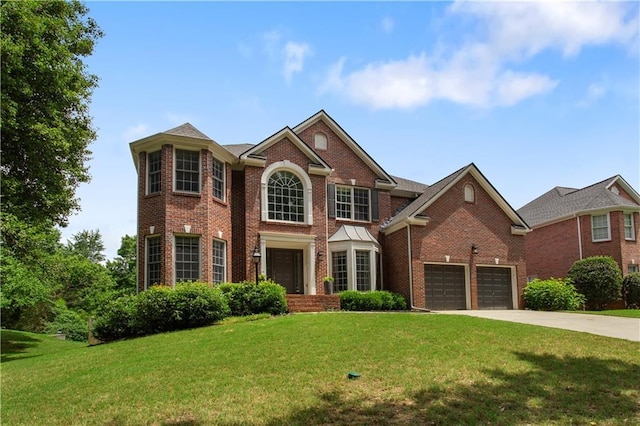 141 Ennisbrook Dr SE, Smyrna, GA 30082 - view of front of home with brick siding, a front lawn, and concrete driveway