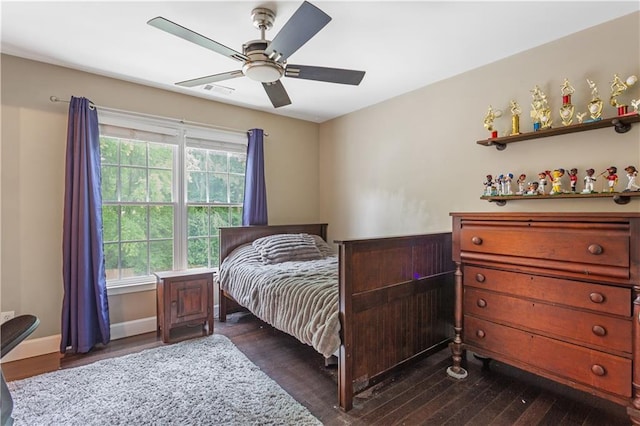 141 Ennisbrook Dr SE, Smyrna, GA 30082 - bedroom featuring dark wood-type flooring, ceiling fan, and baseboards