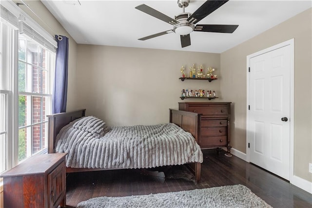 141 Ennisbrook Dr SE, Smyrna, GA 30082 - bedroom with multiple windows, wood-type flooring, baseboards, and a ceiling fan