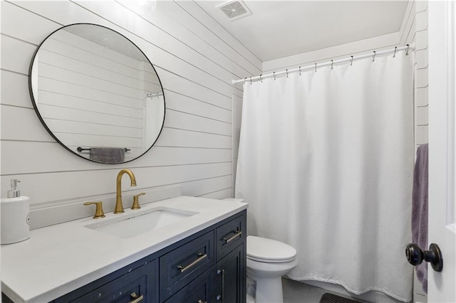 141 Ennisbrook Dr SE, Smyrna, GA 30082 - bathroom featuring vanity, toilet, wood walls, and a shower with curtain