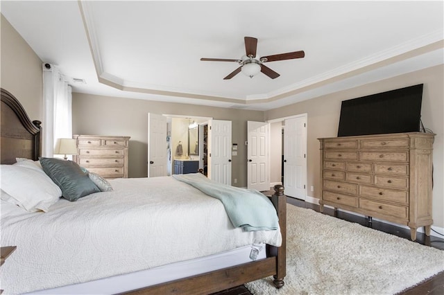 141 Ennisbrook Dr SE, Smyrna, GA 30082 - bedroom featuring baseboards, a ceiling fan, ornamental molding, connected bathroom, and a raised ceiling