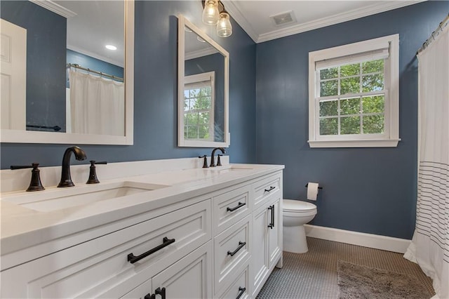 141 Ennisbrook Dr SE, Smyrna, GA 30082 - bathroom with ornamental molding, healthy amount of natural light, double vanity, toilet, and baseboards