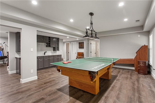 141 Ennisbrook Dr SE, Smyrna, GA 30082 - recreation room with bar with sink, baseboards, recessed lighting, and dark wood-type flooring