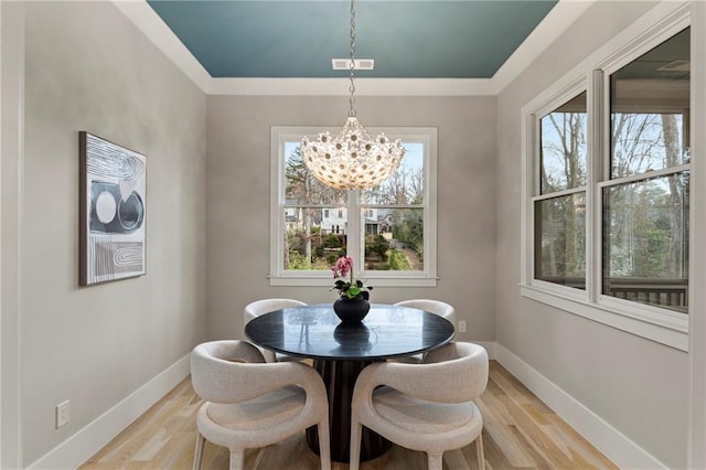 662 Timm Valley Rd NE, Atlanta, GA 30305 - dining room featuring baseboards, light wood-style flooring, and a chandelier