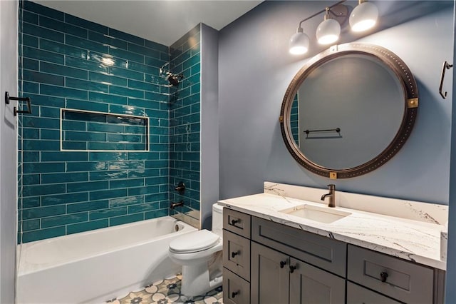 bathroom featuring bathing tub / shower combination, toilet, and vanity