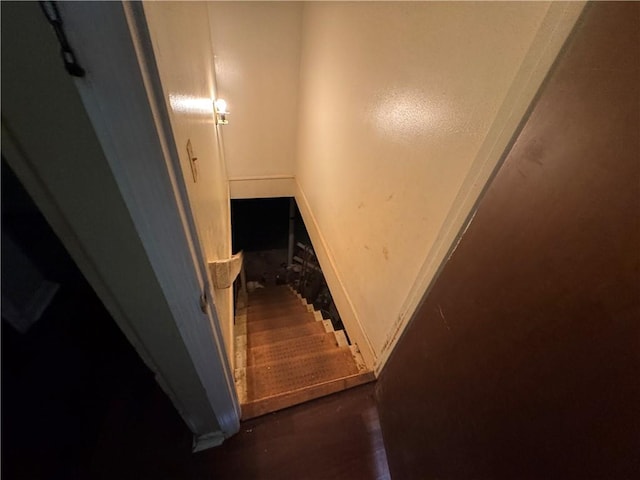 stairway with baseboards