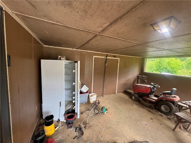garage with wood walls
