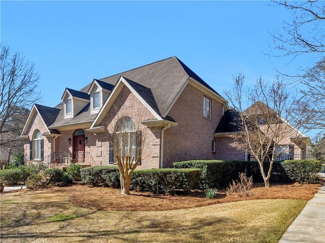 view of front facade featuring brick siding