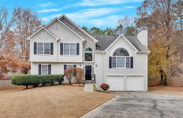 raised ranch with a garage