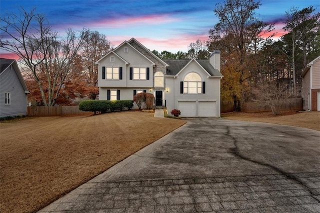 view of front of property featuring a garage